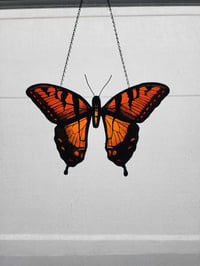 Image 1 of Fiery orange butterfly stained glass