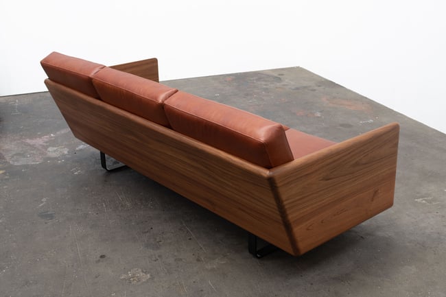 CLOVER COUCH IN TASMANIAN BLACKWOOD WITH BRAZIL LEATHER