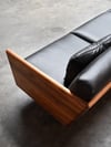 CLOVER COUCH IN TASMANIAN BLACKWOOD WITH  BLACK LEATHER