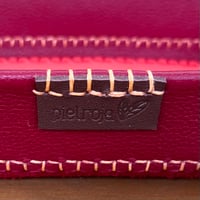 Image 6 of Vaciabolsillos rojo y naranja