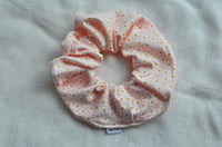 Image 1 of Daisies on Pale Pink Scrunchie