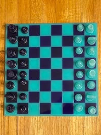 Image 1 of Checker and Chess Pieces with Board