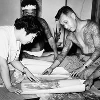 Image 2 of A customer browses Horigorō II designs available. C.1955, Tokyo - Gelatin silver print