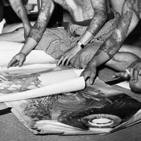 Image 4 of A customer browses Horigorō II designs available. C.1955, Tokyo - Gelatin silver print