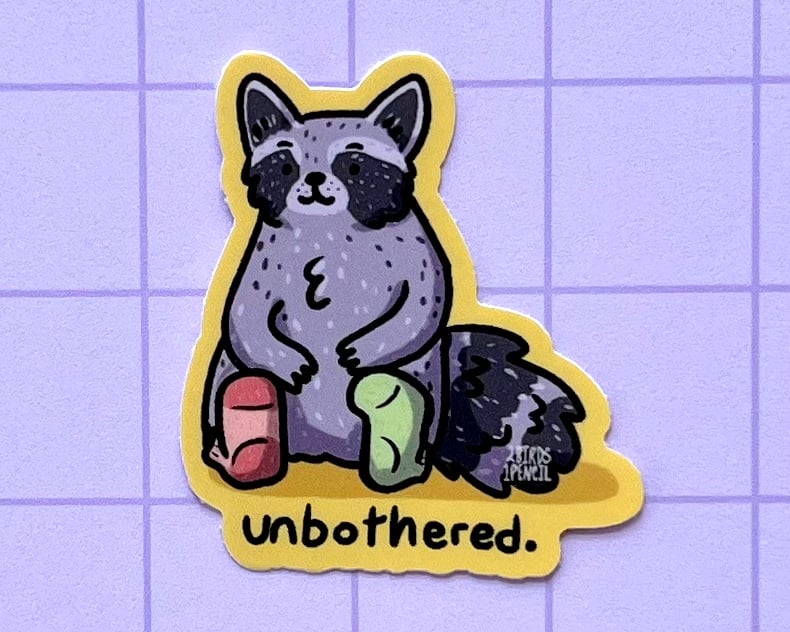 Image of Unbothered raccoon mini vinyl sticker