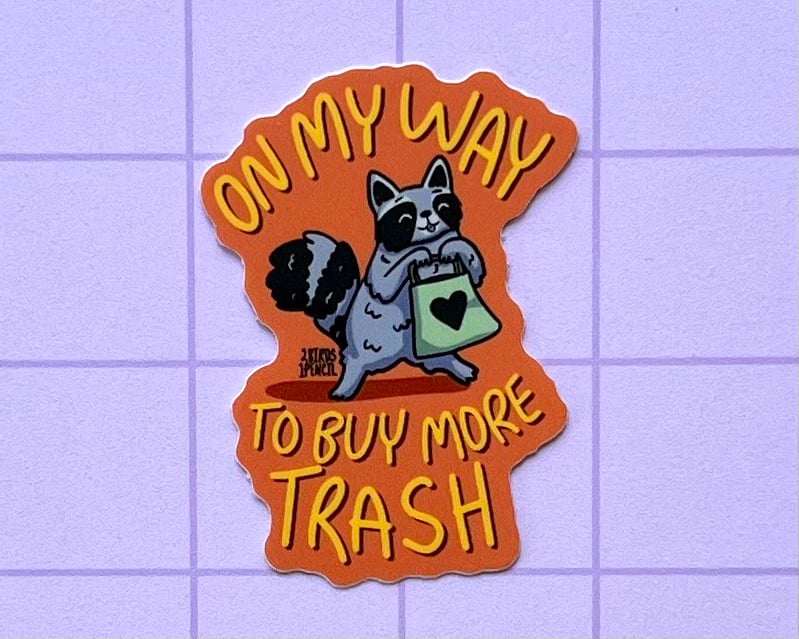 Image of Shopping raccoon mini vinyl sticker