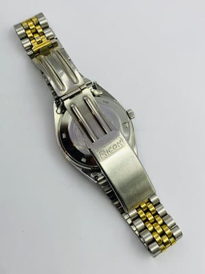 Image of rare eye catching ricoh medallion automatic gents watch,1970's/(VTG-19)