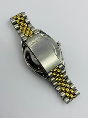 Image of rare eye catching ricoh medallion automatic gents watch,1970's/(VTG-19)