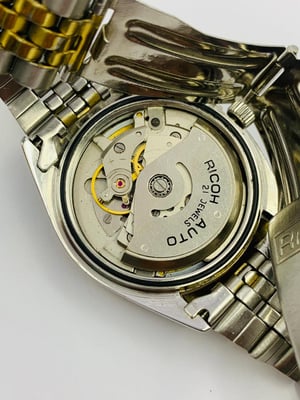 Image of rare eye catching ricoh medallion automatic gents watch,1970's/(VTG-19)