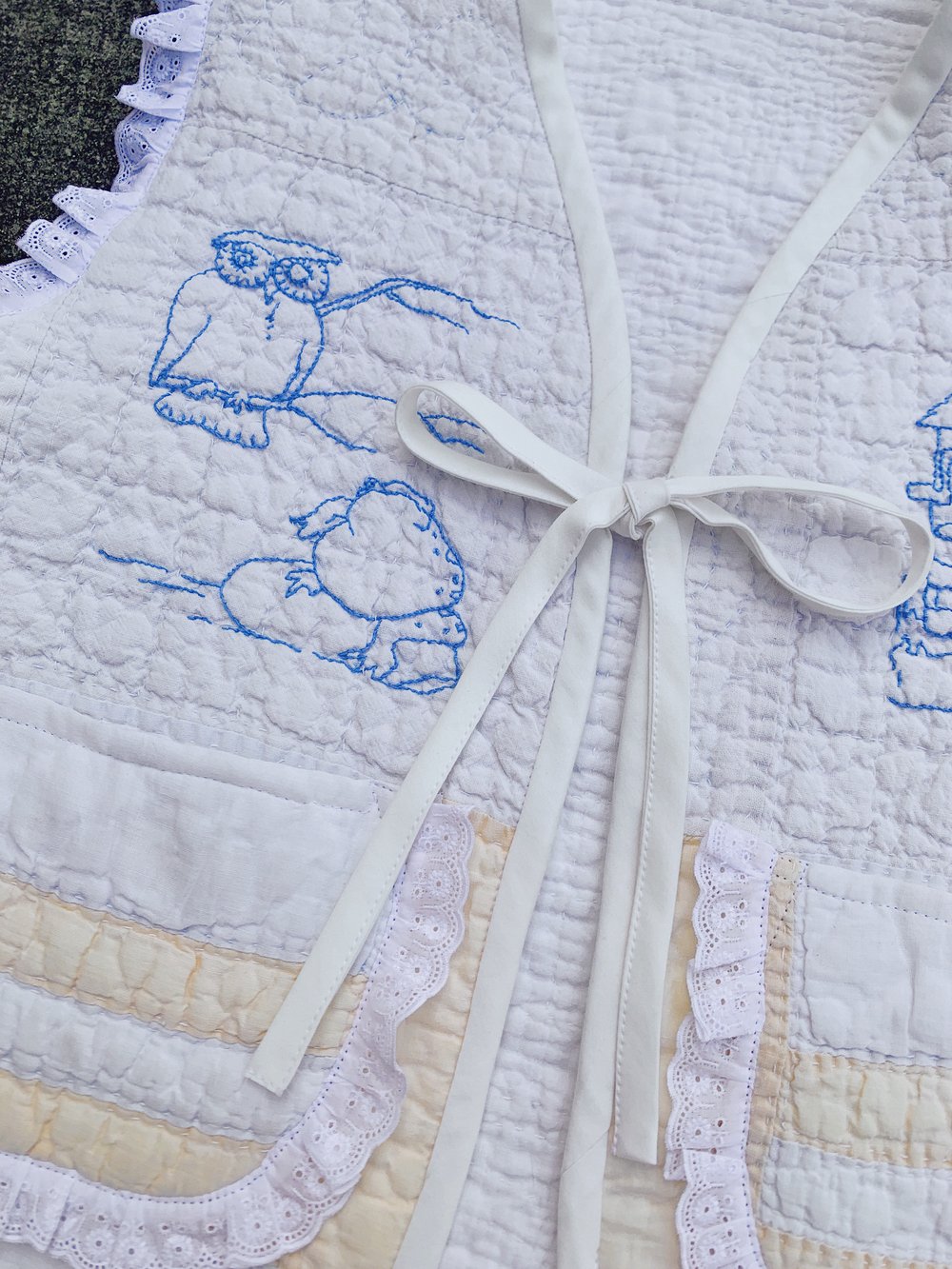 Image of Quilt Vest — White Embroidered Animals