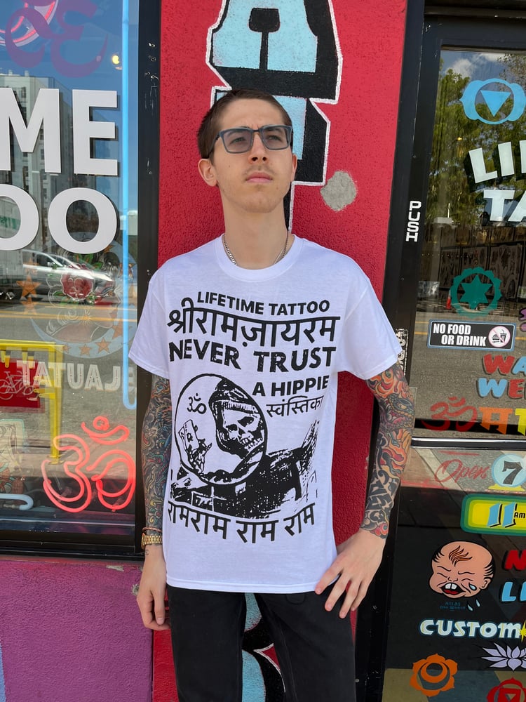 Image of JAI RAM SHRI RAM JAI JAI NEVER TRUST A HIPPIE RAM WHITE TEE