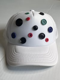 Image 1 of The many buttons hat 