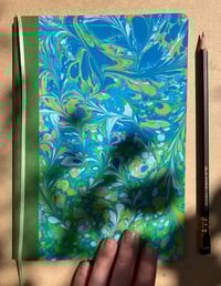 Image 3 of Sky Blue, Fresh Green and White A5 Thick Lined Notebook- Imbolc Snowdrop Pattern