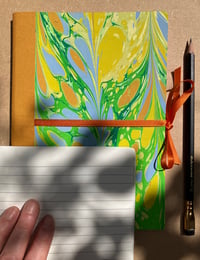 Image 2 of Bright yellow, Pale Orange and Fresh Green Hand-Marbled Thick Lined A5 Notebook- Daffodil Pattern