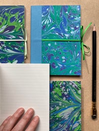 Image 1 of Violet, Green and White Hand-Marbled A6 Lined Notebook- Bluebell Patterns