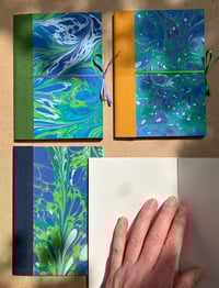 Image 3 of Violet, Fresh Green and White Hand-Marbled Plain A6 Notebooks- Bluebell Pattern
