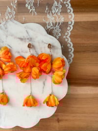 Image 1 of Oversized Orange Flower Dangles (ROSE GOLD)