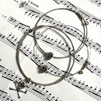 Image 1 of Carl Barat guitar string bracelet