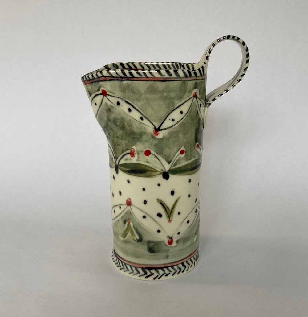 Image of Dish and Jug green spotted leaves pattern.