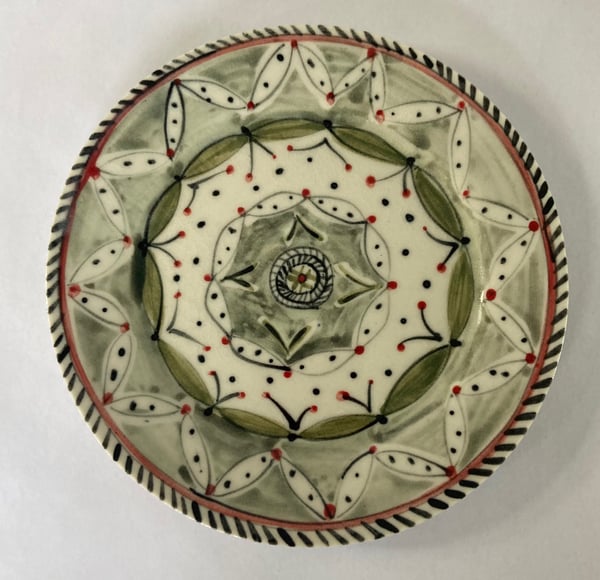 Image of Cup spotted leaf patten, and matching  plate.