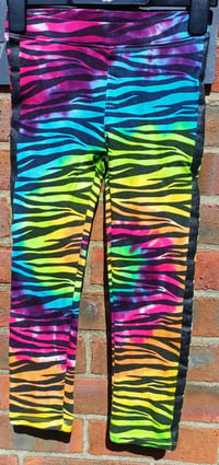 Image 1 of Rainbow zebra leggings age 6-7