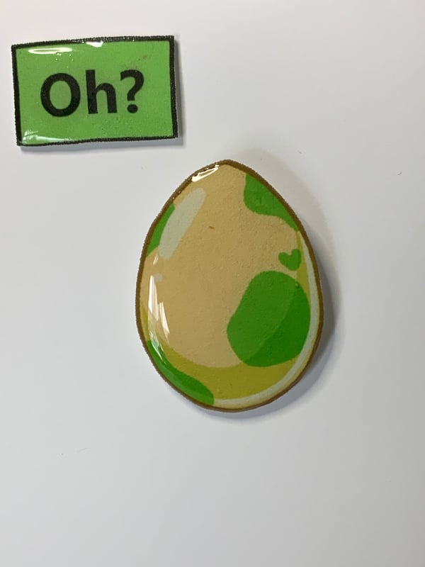 Image of Pokémon shaking egg shrinky dink pin set