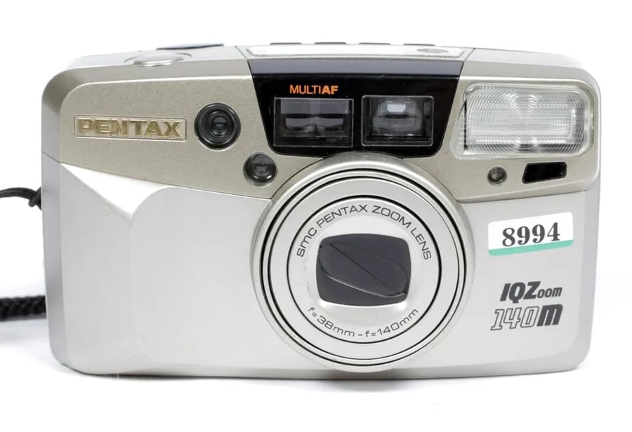 Image of Pentax IQZoom 140m advanced compact 35mm film camera with 38-140mm zoom lens #8994