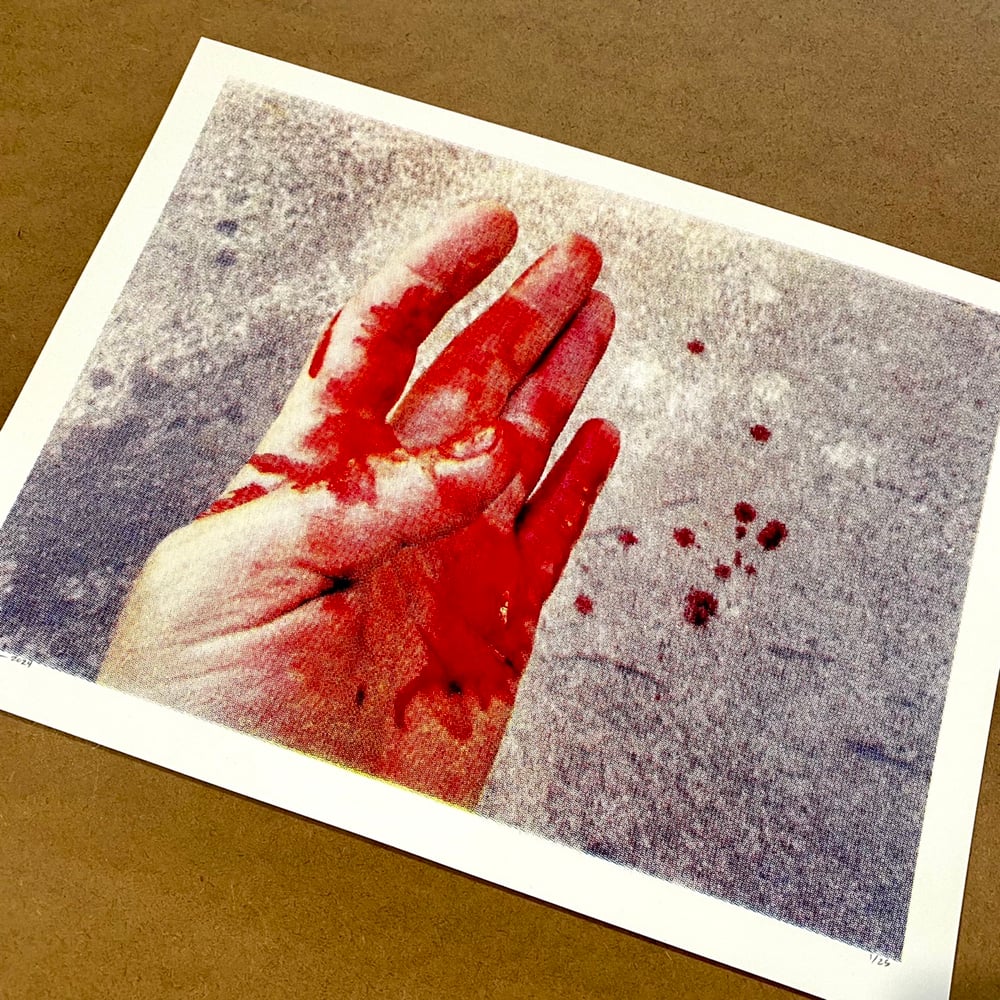 Image of 'cut hand' print