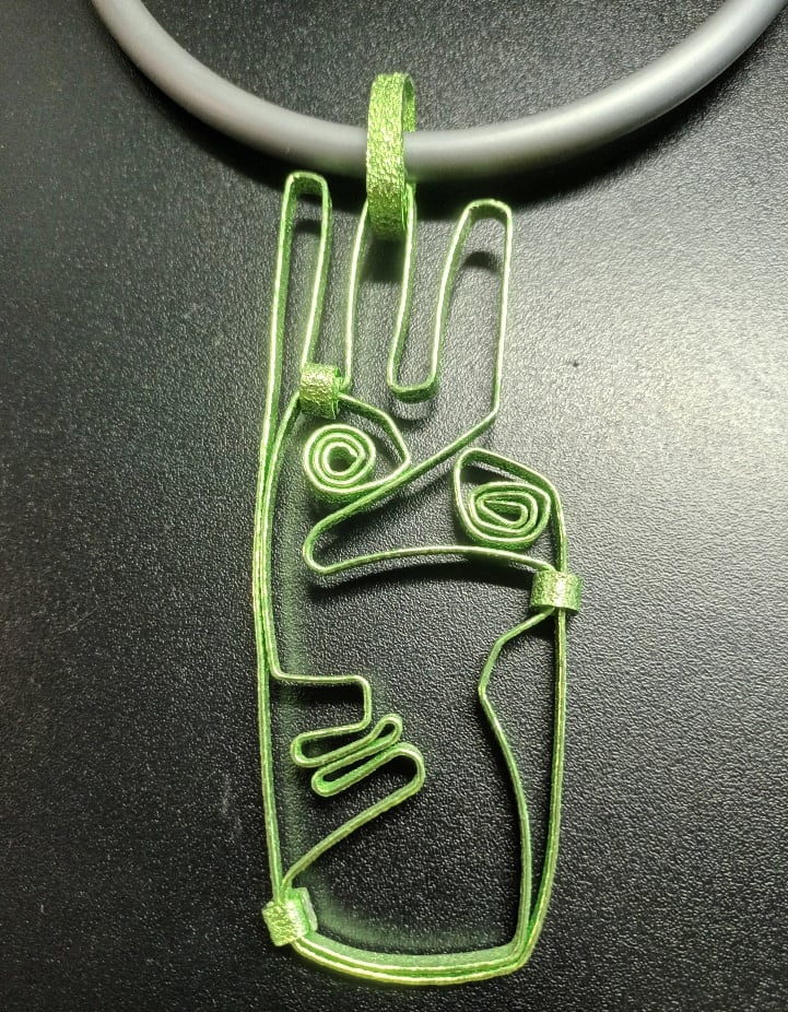 Image of lime green face pendant