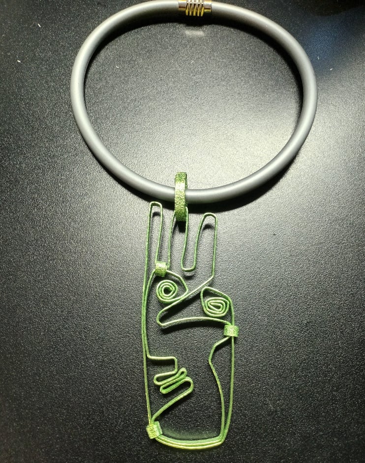 Image of lime green face pendant