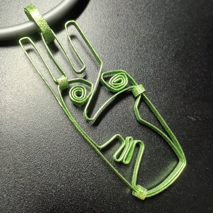 Image of lime green face pendant