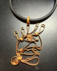 Image 2 of face pendant #2