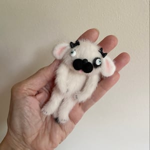 Image of Floppy Puppy in White and Black