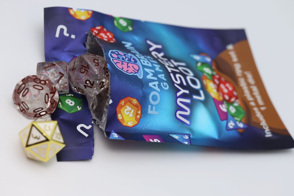 MYSTERY LOOT: PLASTIC RPG DICE SET & BONUS METAL DIE