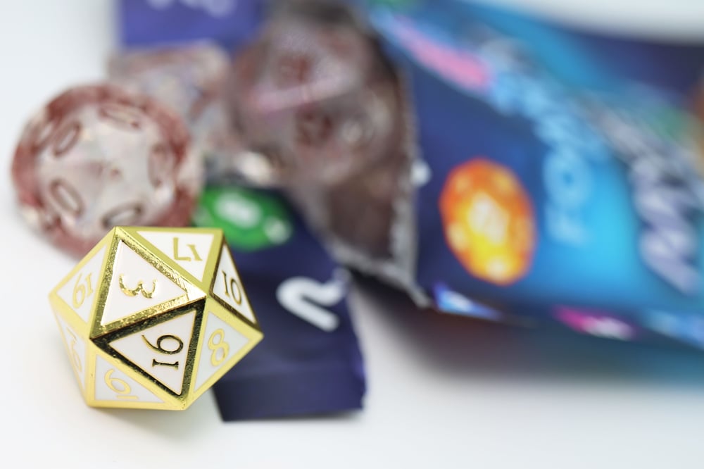 MYSTERY LOOT: PLASTIC RPG DICE SET & BONUS METAL DIE