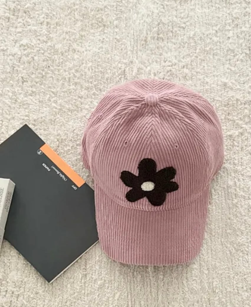 Image of Corduroy caps with plush flower 