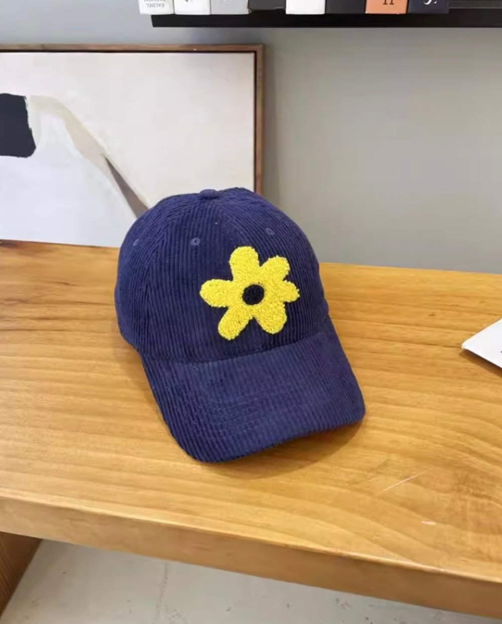 Image of Corduroy caps with plush flower 