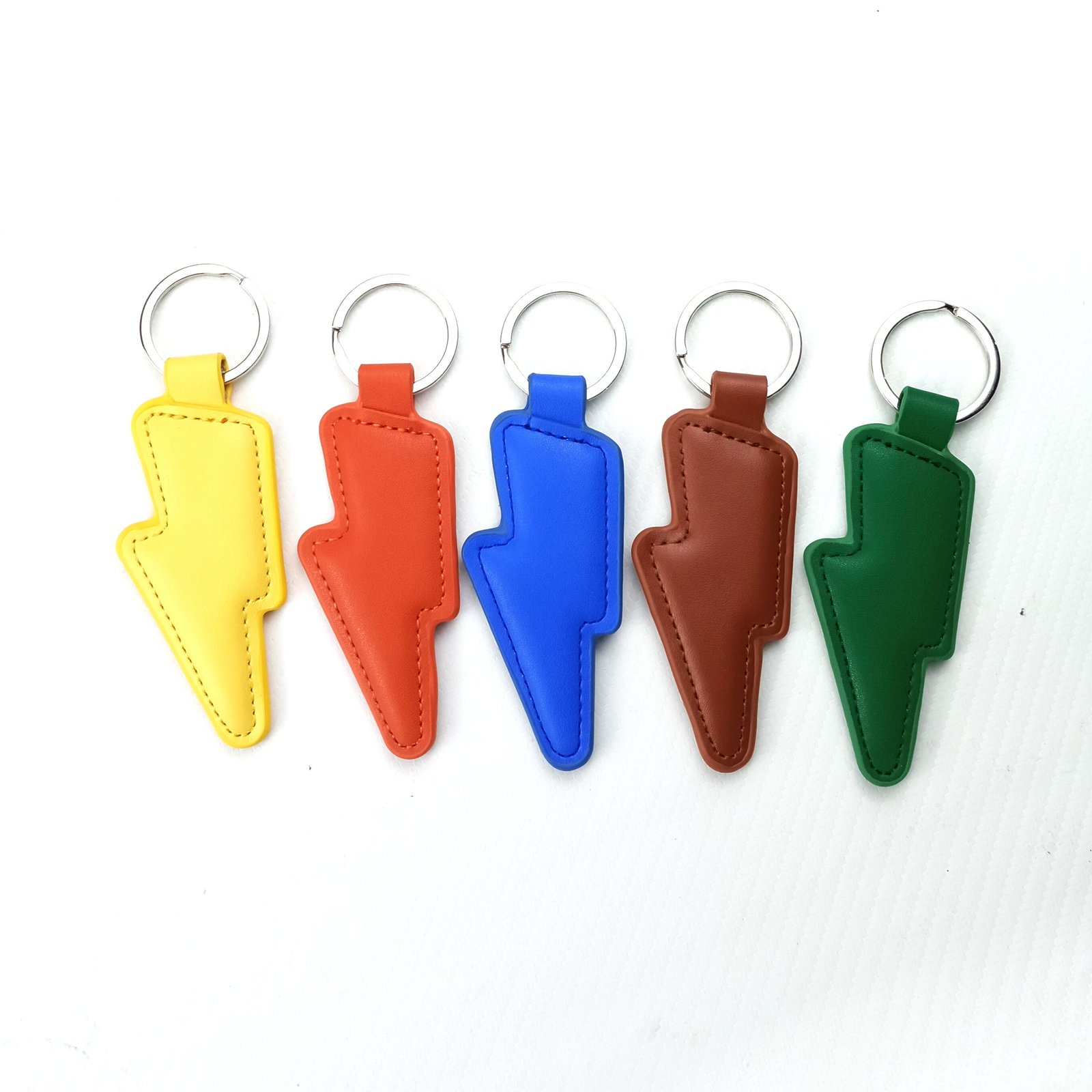 Colourful Lightning Bolt Leather Keyrings | BowieGallery Colourful Lightning Bolt Leather Keyrings | BowieGallery
