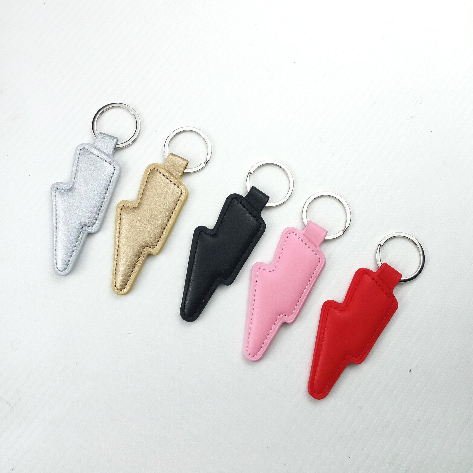 Colourful Lightning Bolt Leather Keyrings | BowieGallery Colourful Lightning Bolt Leather Keyrings | BowieGallery