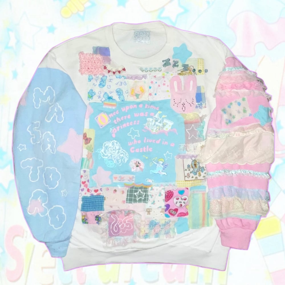 Bedtime story collage sweater 