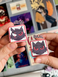 Image 2 of Aym and Baal Square Buttons | Cult of the Lamb