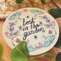 Image 2 of lost in the garden sticker