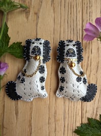 Image 1 of Pair of Staffordshire Spaniel Brooches - Black