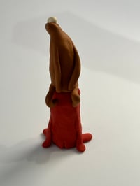 Image 5 of Brown thing on a red thing