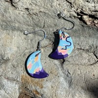 Image 1 of Evening Flight, hand-painted ceramic bisque crescent dragon earrings