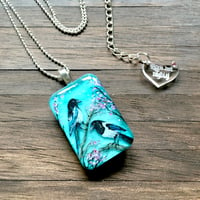 Image 2 of Magpies on Blossom Painted Resin Pendant