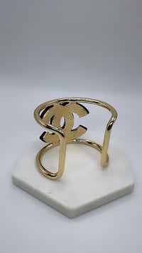 Image 2 of C gold and black cuff