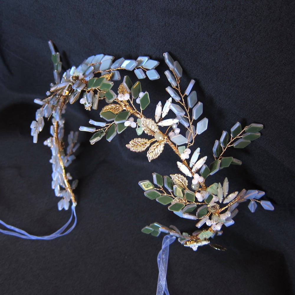 Image of Grove of Vines headpiece