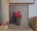 Image of Bouquet de fleurs dans un vase vert