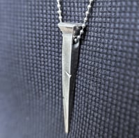 Coffin nail pendant 